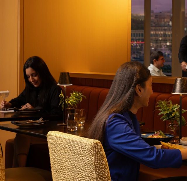 diners in the lounge of Aura Restaurant